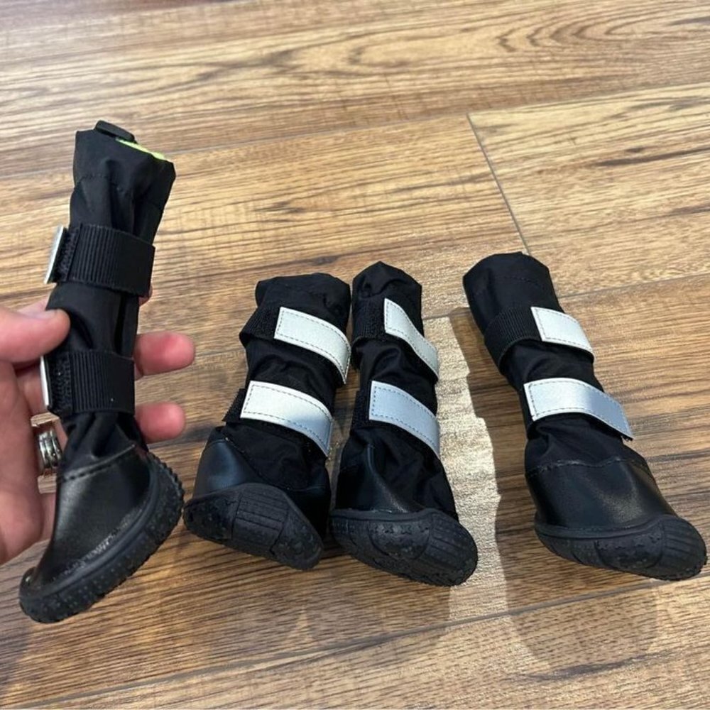Dog boots. Rain/snow. Small dog. Brand new. Reflective strip.